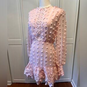 Pink mini dress with lace details